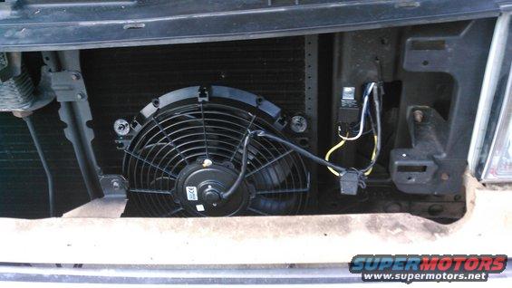 added an electric fan for the A/C condenser. wired it and the A/C clutch to a relay