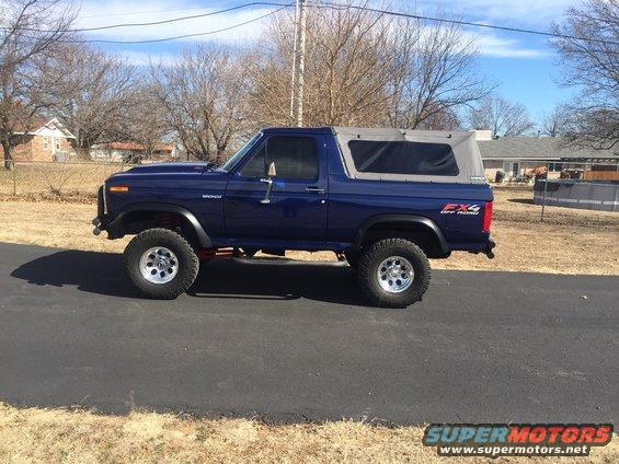 Blue 1982 Ford Bronco with soft top and FX4 Off Road decal