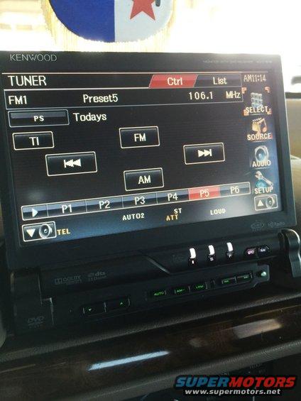 Kenwood tuner display showing FM1 presets and AM/FM buttons