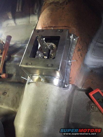 floor8.jpg Front mount for the center console and the tower for the shifter boot. Made it flanged for rivets to match a lot of OEM designs. It got riveted down over a fat bead of seam sealer after everything was painted. It shouldn't rust. 