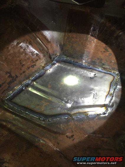Passenger side panel fixed. Any remaining rust got hosed down with rust converter, then rusty metal primer, then rustoleum. I don't want to be back here again. The bottom gets the same treatment plus undercoating at some point. 