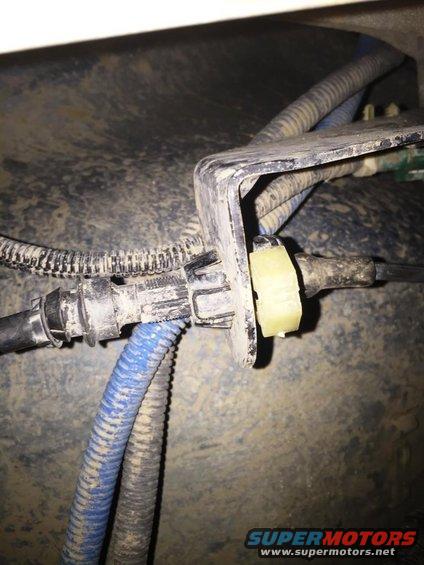 Wiring harness and connectors under the center console
