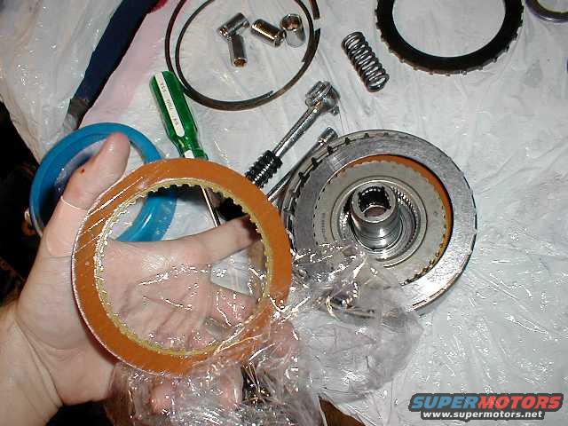 Putting new clutches and steels in the direct clutch drum. Many a people who loose 3rd and 4th wish they could be at this step instantly!