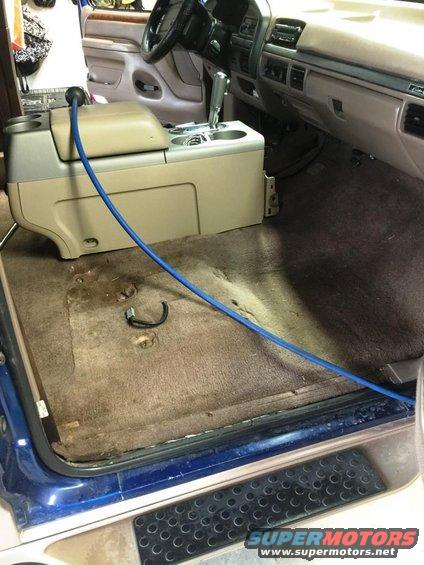 1996 Ford Bronco interior, center console removed, carpet being cleaned