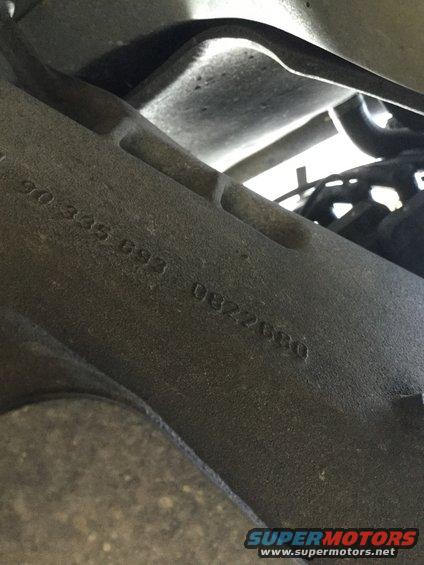 Engine part with stamped numbers 90 335 093 and 08Z2080
