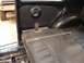1964 Volkswagen Beetle - Vehicle interior with fuel tank and side panel visible.