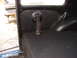 1964 Volkswagen Beetle - Close-up of a vehicle's interior showing a black panel and a flexible hose.