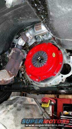 red clutch assembly bolted to engine block