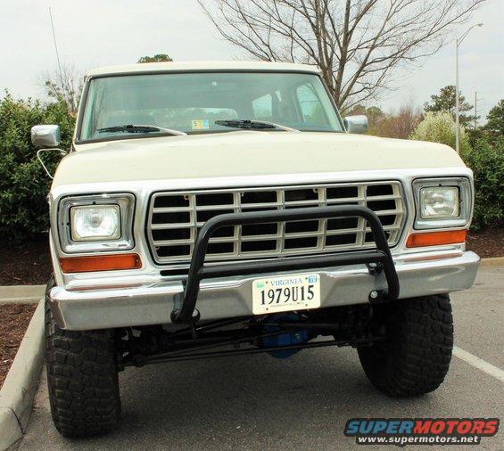 Front view of a white Ford Bronco, license plate reads 1979U15