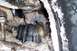 1988 Chevrolet Silverado 2500 - A damaged CV axle boot, likely from a truck, is visible covered in snow and dirt.