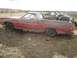 1971 Ford Ranchero - This 1971 Ford Ranchero is parked outdoors with tires loaded in the bed. Another truck is visible behind it.