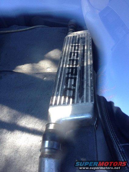 Intercooler with 'PROBE' text visible, possibly from a car engine bay