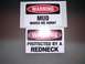 1979 Ford Bronco - Two humorous warning stickers are shown, one about mud and another about being protected by a redneck.