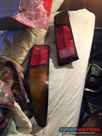 Pair of red and amber car tail lights