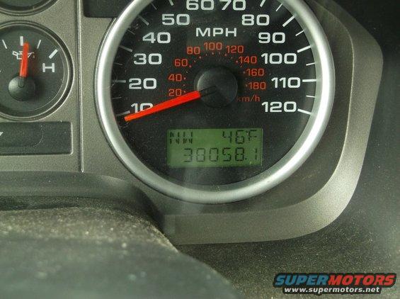 2005 Ford F-150 dashboard showing speedometer, fuel gauge, and odometer reading 30058.1