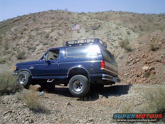 not-touchin.jpg the wife wanted to see how far i could stuff the tire into the well.