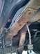 Old Stuff: Original leaf springs lifted with Rough Country blocks, old Hecklethorn shocks