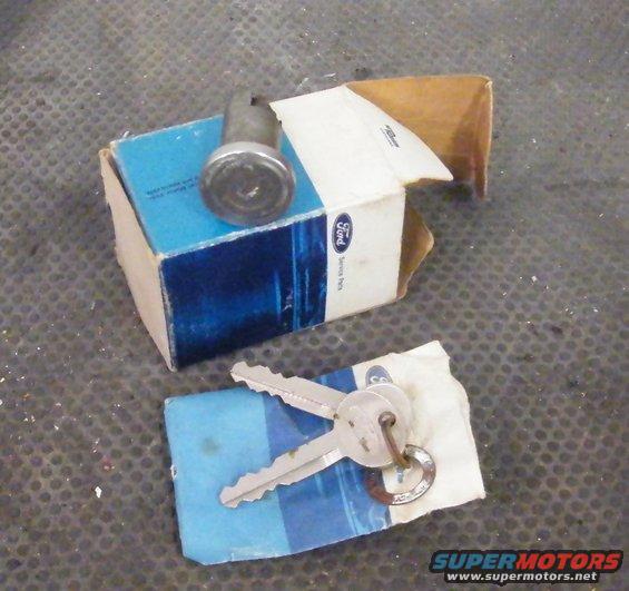 Ford ignition lock cylinder and two keys on blue and white packaging