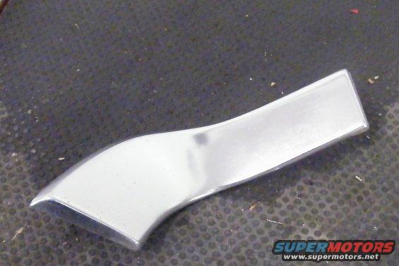 Chrome trim piece with curved design