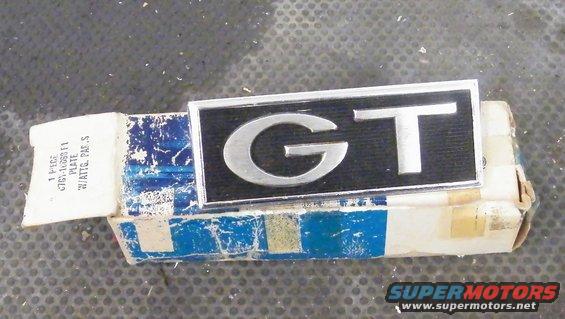GT emblem on a box with part number C7G1-16899-F1