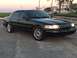 2008 Ford Crown Victoria - A black 2008 Ford Crown Victoria is shown from a three-quarter front perspective.