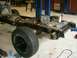 1978 Ford Bronco - The chassis and drivetrain components of a vehicle are shown, possibly undergoing restoration or modification.