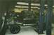 1978 Ford Bronco - This 1978 Ford Bronco is being worked on in a garage, with its doors open and interior exposed.