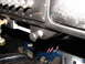 1964 Volkswagen Beetle - Close-up of a vehicle's interior, showing the dashboard and floor pedals with exposed wiring.