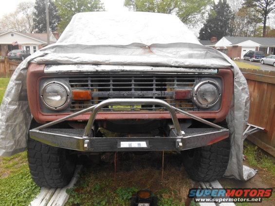 1972 Ford Bronco front with custom bumper and tarp cover