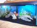 1978 Ford Bronco - A fish tank scene with a bright blue background and various decorations.