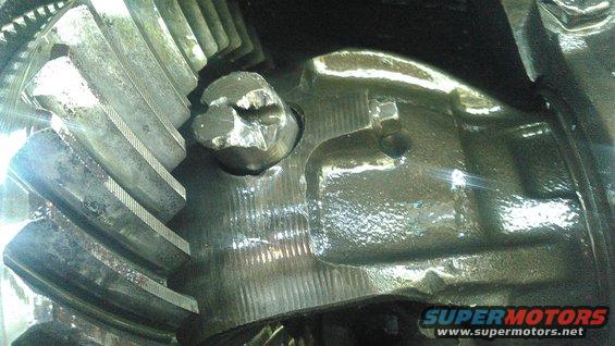 2.jpg the crosspin retaining bolt was still in but the crosspin itself clearly broke through it somehow. its common for the retaining bolt to break but it would have to break twice in the perfect locations for it to allow the pin the slide out. 

a couple months ago i had jsut replaced the spider gears and crosspin due to the spiders wearing the pin badly. the retaining bolt was broken and still held the pin

the pin is actually snapped in half and the end of this hit the pinion gear causing the lock up.