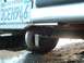 1990 Ford Bronco - Close-up of a rear tow hook and a California license plate on a vehicle.