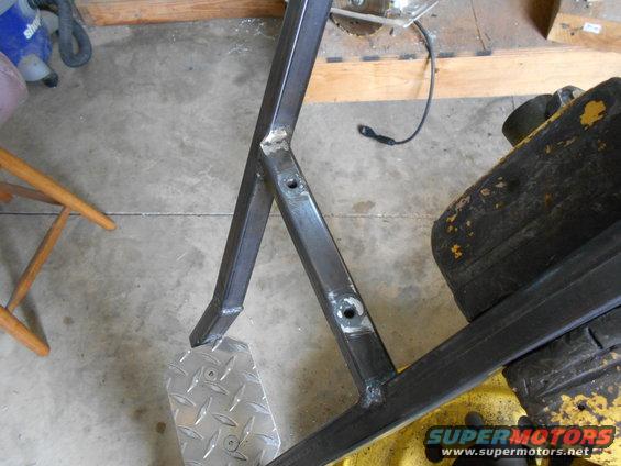metal frame with diamond plate step, part of some equipment