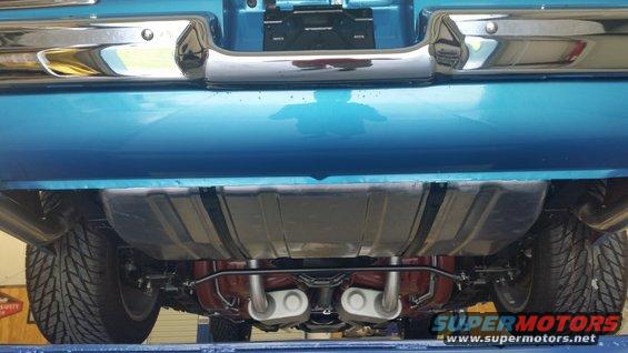 Blue 1970 Pontiac Trans Am rear underside with dual exhaust and chrome bumper