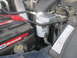 2007 Ford F-250 - Close-up of a WIX coolant filter installed in the engine bay next to the battery.