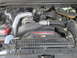2007 Ford F-250 - Close-up view of the engine compartment, highlighting the Power Stroke V8 Turbo Diesel engine.