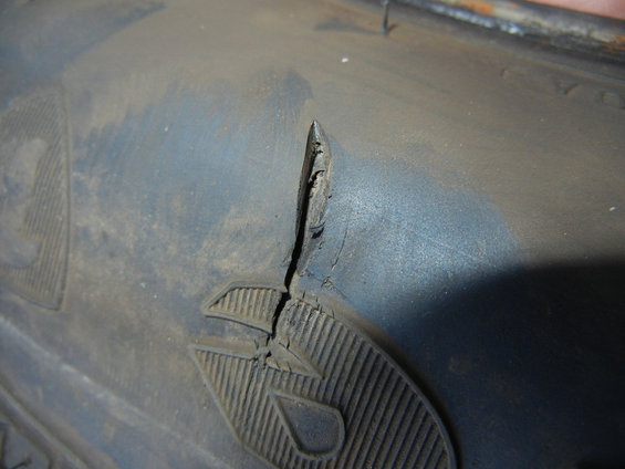 dscn3127tire3sidewallgashdownintocord.jpg Used tire purchased from and installed by Tires and More for Less in NE Minneapolis on 03May2016, pic11.  Upon returning to Tires and More for Less later in the day on 05May2016 to return the four used tires I purchased from them, I told them a second tire they sold me was also damaged, with a dangerous cut in the sidewall that visibly went into the cord.  This photo shows a view with my thumb lightly pressing from behind to help display the depth of the cut.  The manager of the used tire store immediately blamed the major-brand tire store for causing the sidewall damage when they removed the tire from the rim, causing me to review the photos I took the day before. The first and last photos in this folder show this cut was present while the tire was mounted to my car, just the way it was originally installed by the used tire store.  The store only offered a partial refund, while I asked for a full refund, so I left the four tires at the store without any refund and filed for a full refund with my VISA card.   VISA reviewed my claim and wrote back, &quot;... the claim does not qualify as a recognizable billing error under consumer protection laws...&quot;.  VISA recommended I return to the store to negotiate a refund.  I then did, but the negotiation failed, as it did previously.