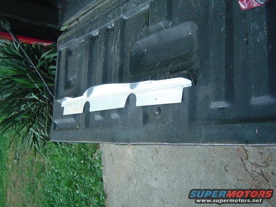 dsc00038.jpg I cut out and shaped this simple gap filler from a piece of scrap sheet metal. (Painted with aluminum paint)