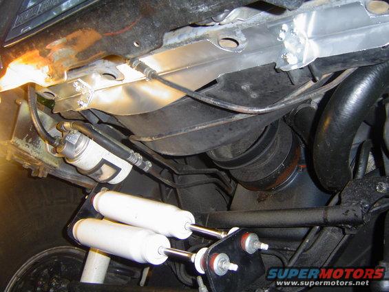 Gap filler in place. It attaches to the lower core support with six sheet metal screws and to the fan shroud with two 1/4" bolts with nyloc nuts. There is still a small gap where the notch is in the shroud, I will fill this and the two notches on the side of the shroud at a later date.