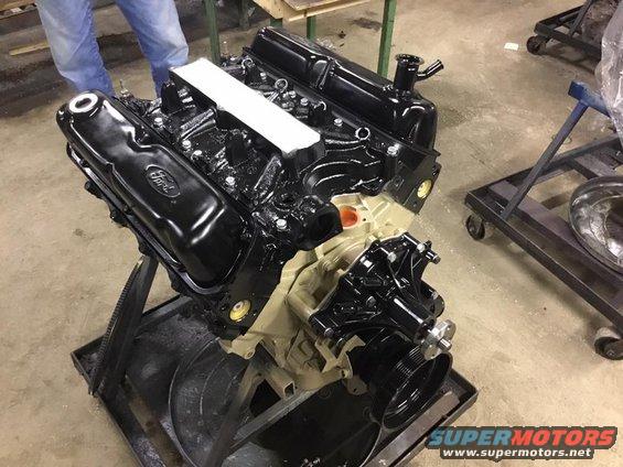 Completely rebuilt with one head replaced (didn't pass flow test) by Motor Works in Spokane, WA. Paint is included in their fee....boy she looks different huh?