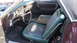 1972 Ford Ranchero - The interior of a 1972 Ford Ranchero shows its distinctive green and black seating and dashboard.