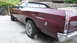 1972 Ford Ranchero - Rear view of a maroon 1972 Ford Ranchero showing its distinctive taillight and chrome bumper.