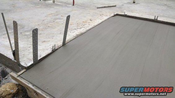 img_20160509_170410092.jpg May 9, the front porch, West porch, & master shower were poured.