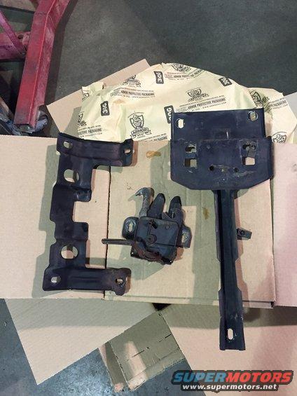 Hood latch assembly and mounting brackets