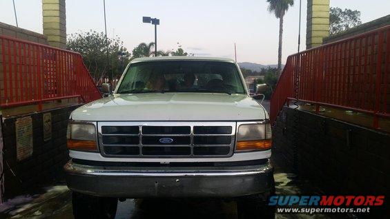 1992 Ford Bronco front view at a car wash