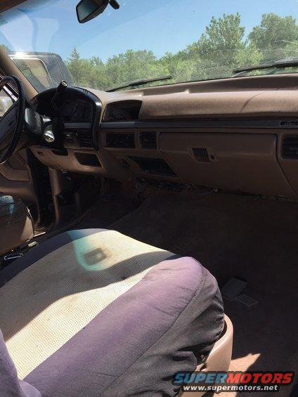 Interior view of a 1994 Ford Bronco, showing dashboard and seats