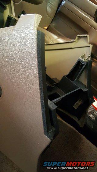 Interior center console plastic trim piece removed from vehicle