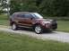 2016 Ford Explorer - This 2016 Ford Explorer is shown in a three-quarter front view on a gravel driveway.
