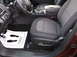 2016 Ford Explorer - The interior of a 2016 Ford Explorer, the driver's seat, dashboard, and a floor mat with footprints.