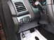 2016 Ford Explorer - Interior view of a vehicle's dashboard, showing the driver's side controls and floor mats.